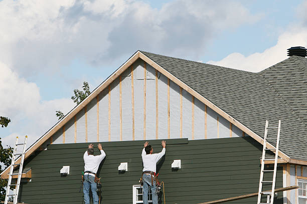 Professional Siding Replacement technician working in Floral Park, NY